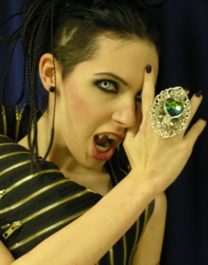 Female model photo shoot of Madison Bickel in Howl o Scream 2009