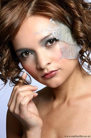 Female model photo shoot of vivid make-up design