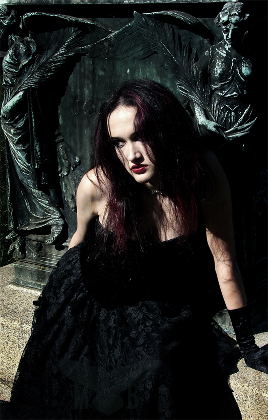 Female model photo shoot of Madame Black Photograph and Sparks in Rock Creek Cemetery, D.C.