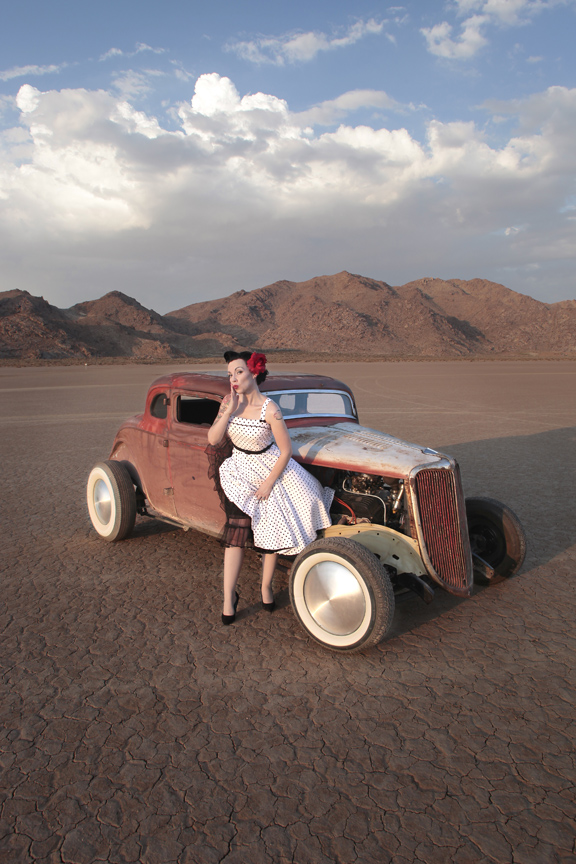Male and Female model photo shoot of automotive photography and Dolly Marlowe in Dry Lake bed in California