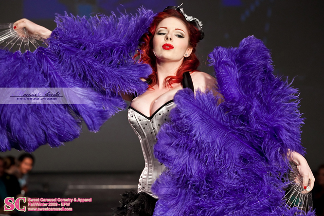 Female model photo shoot of Lucky Lamour in Edmonton Fashion Week, clothing designed by Sweet Carousel Corsetry
