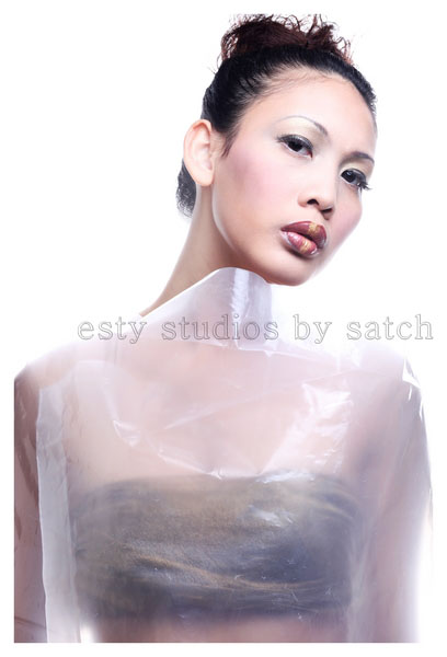 Female model photo shoot of PP Yau and Mei  C by satch satch, makeup by PP Yau