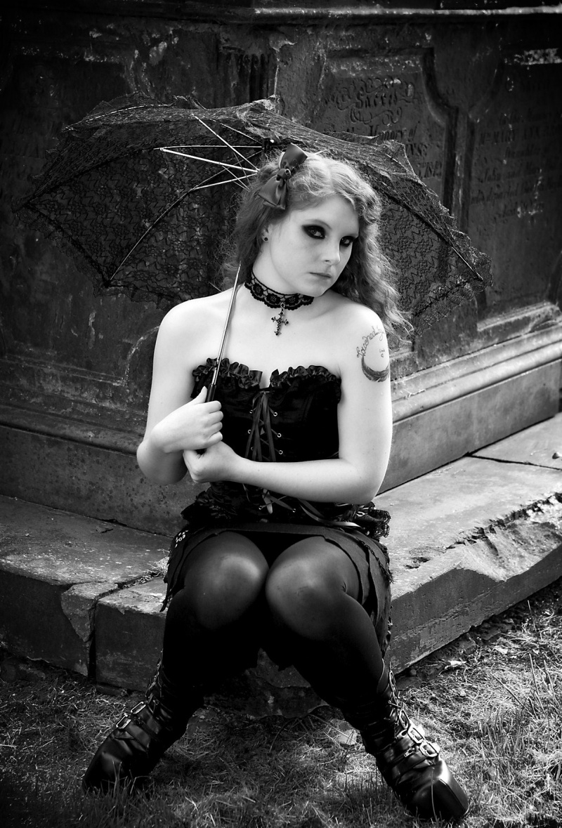 Female model photo shoot of burlesque_butterfly in a church grave yard in Wednesbury West midlands