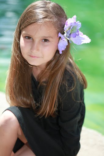 Female model photo shoot of Dizzy Lizzy in Centenial Park Santa Ana