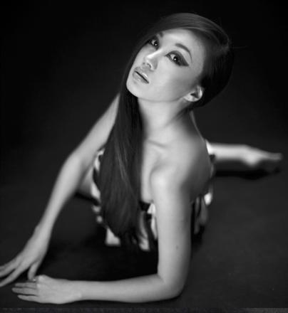 Female model photo shoot of sheena -sg by lim ching, makeup by Shashamsi