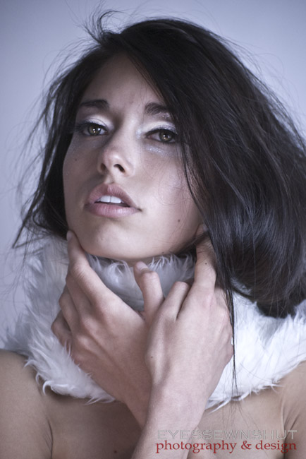 Female model photo shoot of Eyes Sewn Shut  in studio
