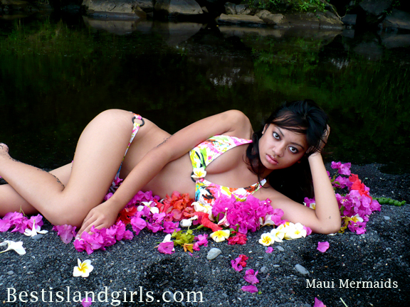 Female model photo shoot of Hawaiian Mermaids in River behind my house