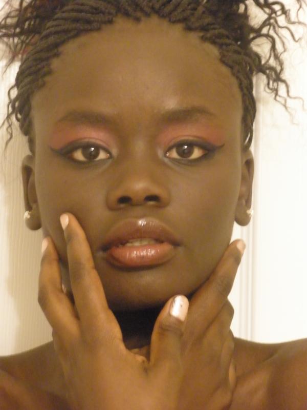 Female model photo shoot of Kenyan Coco