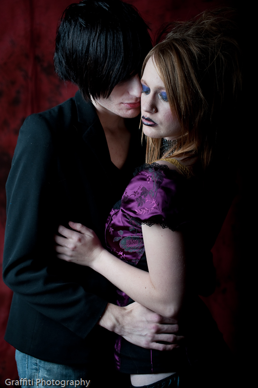Male and Female model photo shoot of Malicious Mike and Mrs Foxy by Graffiti Photographic in Halloween Bash 2, hair styled by RAB 13, makeup by Amber IB