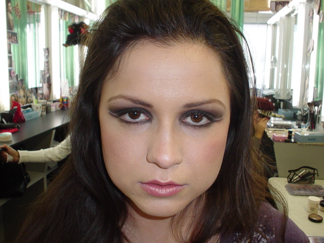 Female model photo shoot of KM Makeup