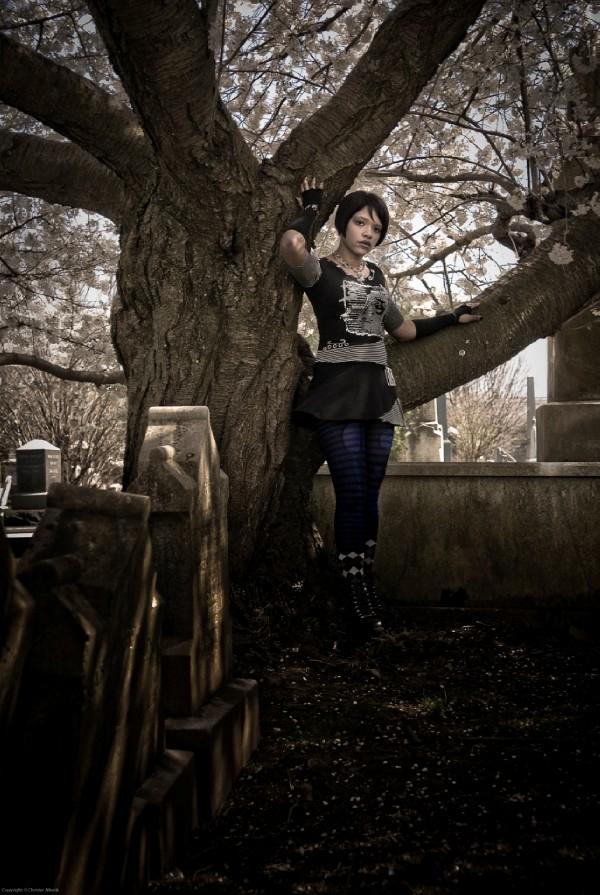 Female model photo shoot of Foxy Squire by AllevikPhoto in Princeton Cemetary