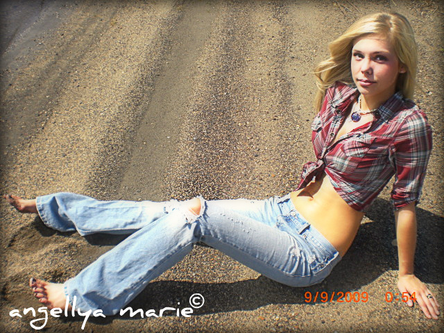 Female model photo shoot of Angellya Marie in Oacoma River Flats