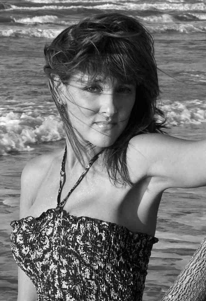 Female model photo shoot of Shelley Savannah in Surfside Beach, Galveston, TX