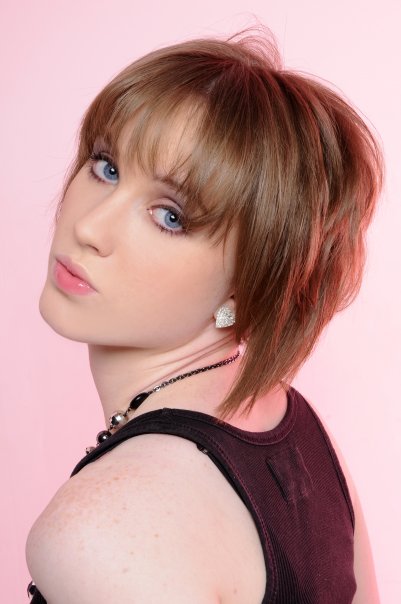 Female model photo shoot of roxy blue eyes