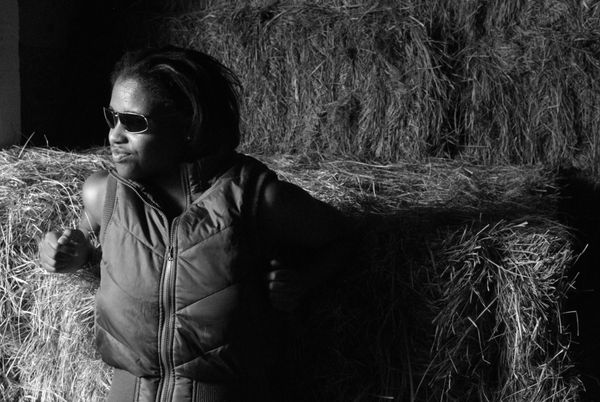 Female model photo shoot of Tabria etuk in Corn maze