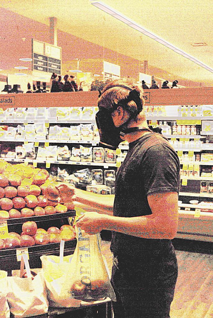 Male model photo shoot of KE Images in a Grocery Store 