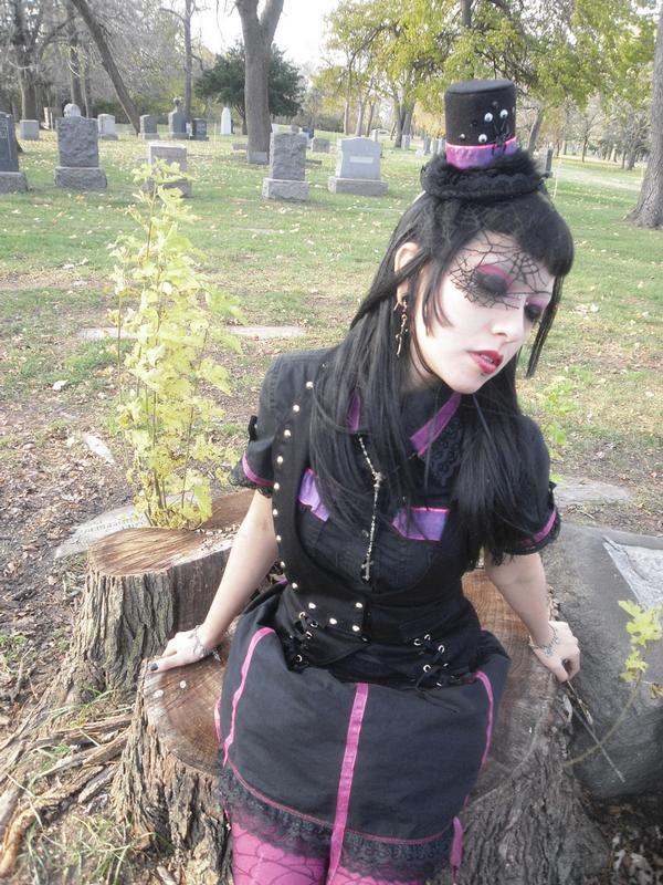 Female model photo shoot of Spooky Manikin in 87th Kedzie ave Cemetery, Chicago.