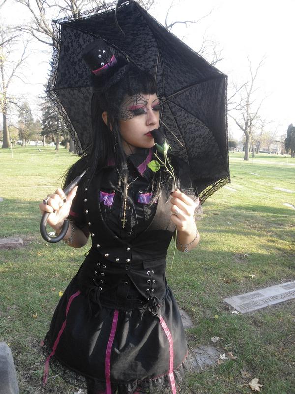 Female model photo shoot of Spooky Manikin in 87th/Kedzie cemetery Chicago