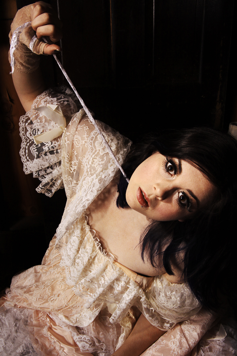 Female model photo shoot of Devan The Impaler by Lucid-Grafx Photography in the murder attic