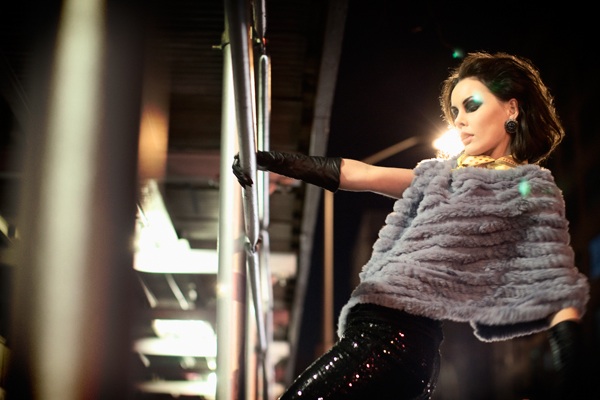 Female model photo shoot of Metteliva Sofia Henning in On the scaffold