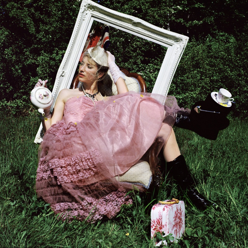Female model photo shoot of Pink cupcake -Sam in London