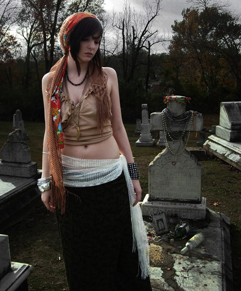 Female model photo shoot of Mariah King in Rosehill Cemetery. Meridian, Mississippi - grave of the Queen of the Gypsies