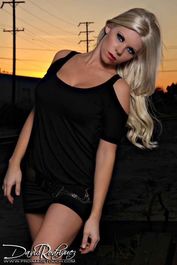 Female model photo shoot of Nicole C Johnson in Sunset in Huntington Beach