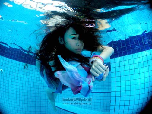 Male and Female model photo shoot of Bobo Underwater Pixel and Elaine Tam in Scuba Adventures Cheras