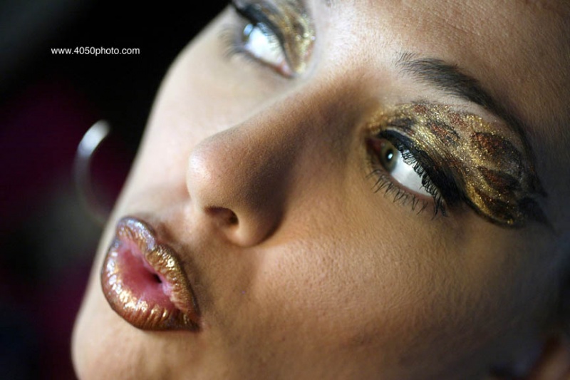 Female model photo shoot of madam kung fu makeup