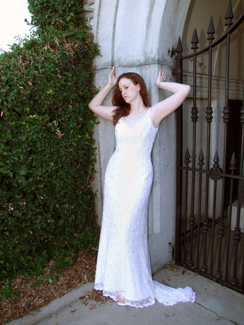 Female model photo shoot of Lillian Nicole by Rodenstock  Furstenberg in New Orleans Memorial Cemetary