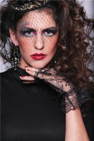 Female model photo shoot of Maryam Tafazoli by Facet Studio, makeup by StarFacez Makeup