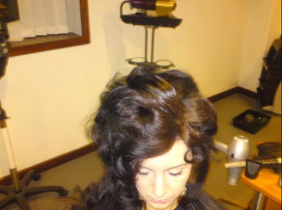 Female model photo shoot of GlitterAndGold in Belfast Hair Show