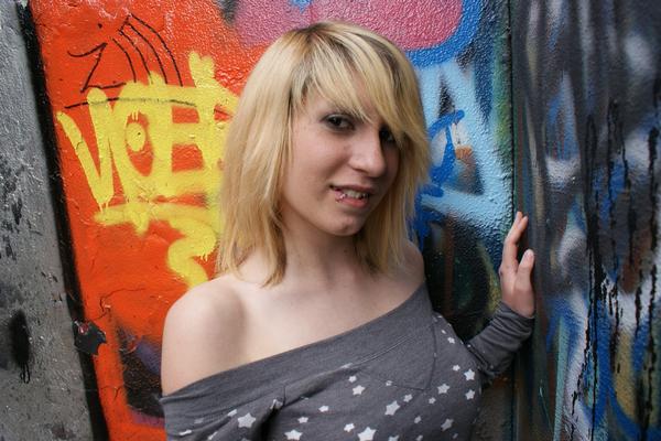 Female model photo shoot of Olivia Master in Graffiti Graveyard, Duluth