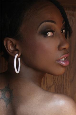 Female model photo shoot of Makeup by Quiyanna