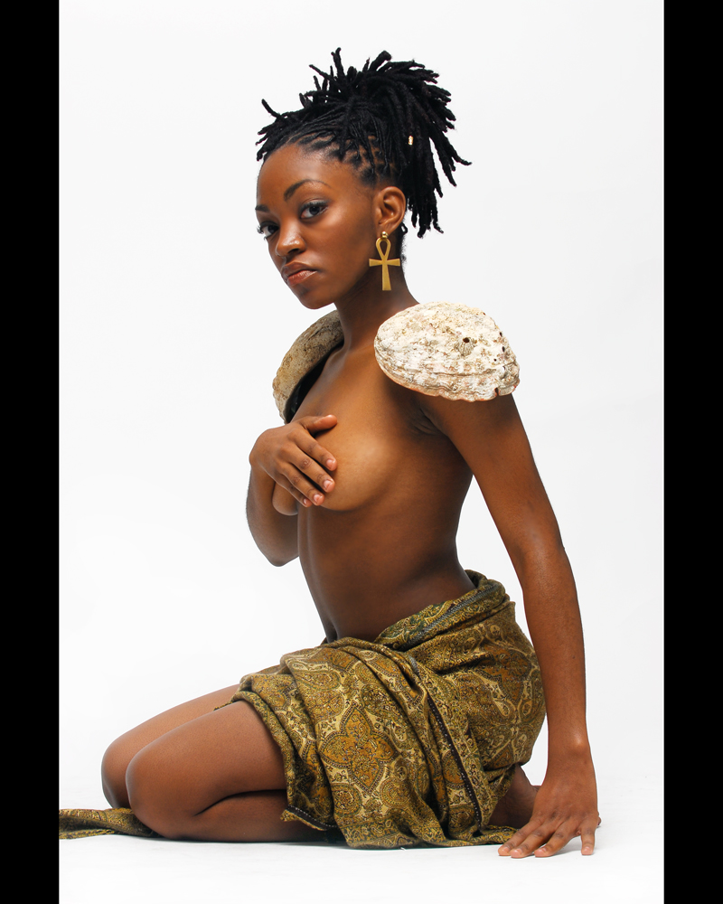 Female model photo shoot of DiscoMakeupAire in 38th st G studios