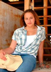 Female model photo shoot of Ashle Holbrook in Stockyards in Oklahoma City, Oklahoma