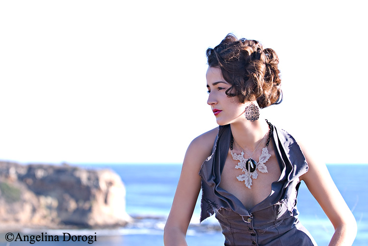 Female model photo shoot of Liz Law Jewelry in Palos Verdes Cliffs