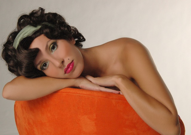 Female model photo shoot of blackcat makeup