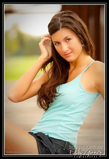 Female model photo shoot of Brittney Marie Cicotte in Outside behind a club house.