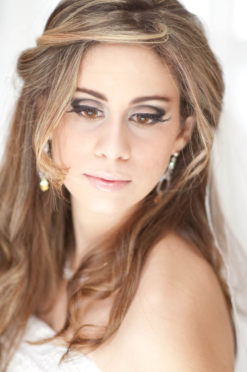 Female model photo shoot of Lilis Weddings Makeup a