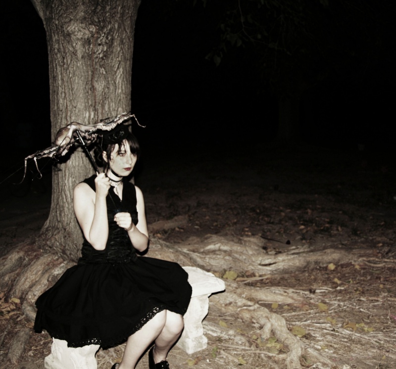 Female model photo shoot of Claudia_Alvarado in Graveyard