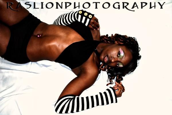 Female model photo shoot of Myeasha W by RASLIONPHOTOGRAPHY in St. Pete, FL