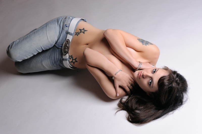Female model photo shoot of Miss Class Model in studio - Vinovo
