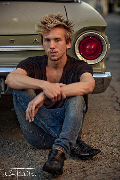 Male model photo shoot of Yves Roscoe in Car Garage
