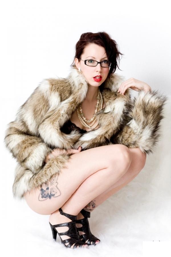 Female model photo shoot of Kitty Cut Throat by Erotobot