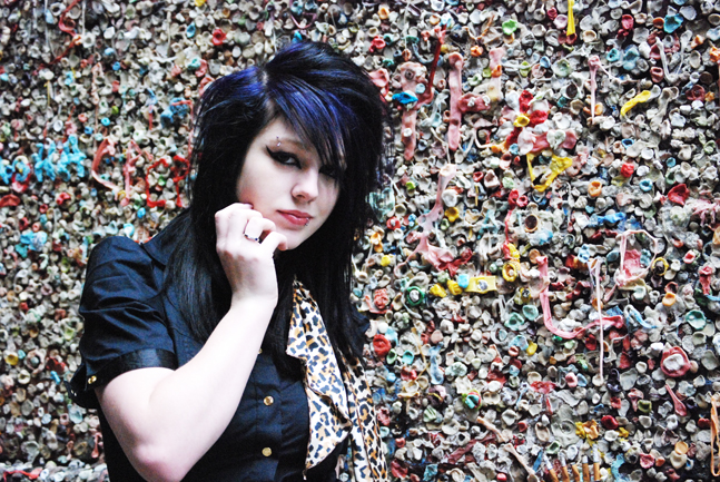 Female model photo shoot of BurninglightPhotography in Post Alley Gum Wall Pike Place Market Seattle WA