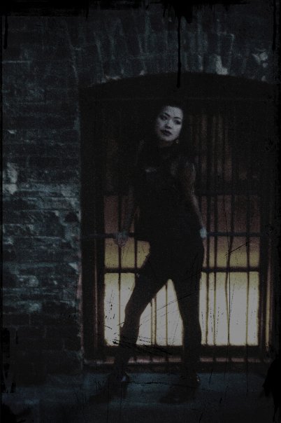 Female model photo shoot of Kelly Jo Petersen in third ward alleyway milwaukee wisconsin
