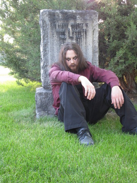 Male model photo shoot of Daemon Darkened in Kamloops Graveyard