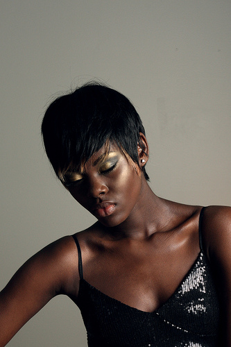 Female model photo shoot of Una Momolu by Emilia Ray Creative, makeup by Madeliene Sieffert