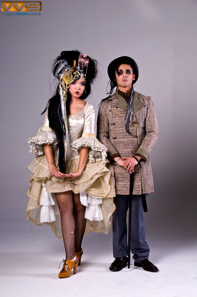 Male and Female model photo shoot of Visitor in a Silk Hat and Moxie Macabre by Bobby Deal in Vegas Vision Studios, makeup by CKO